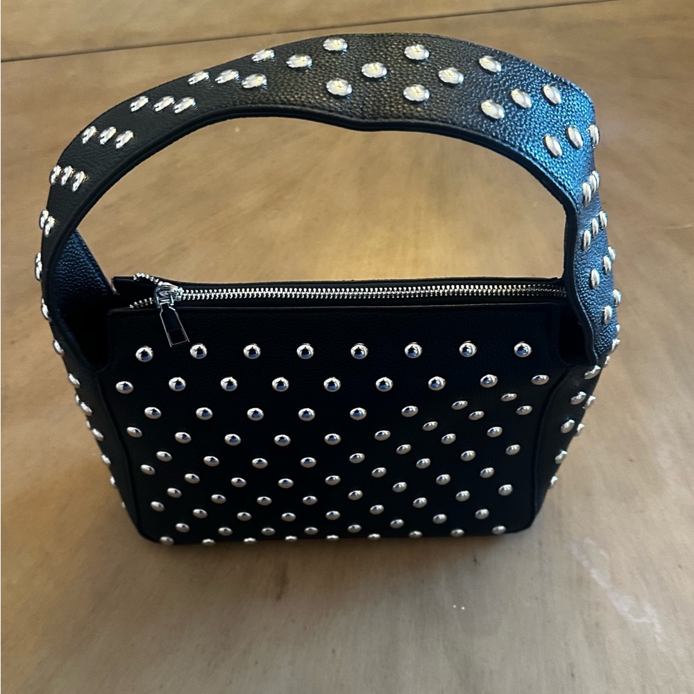 Studded Black shoulder bag.